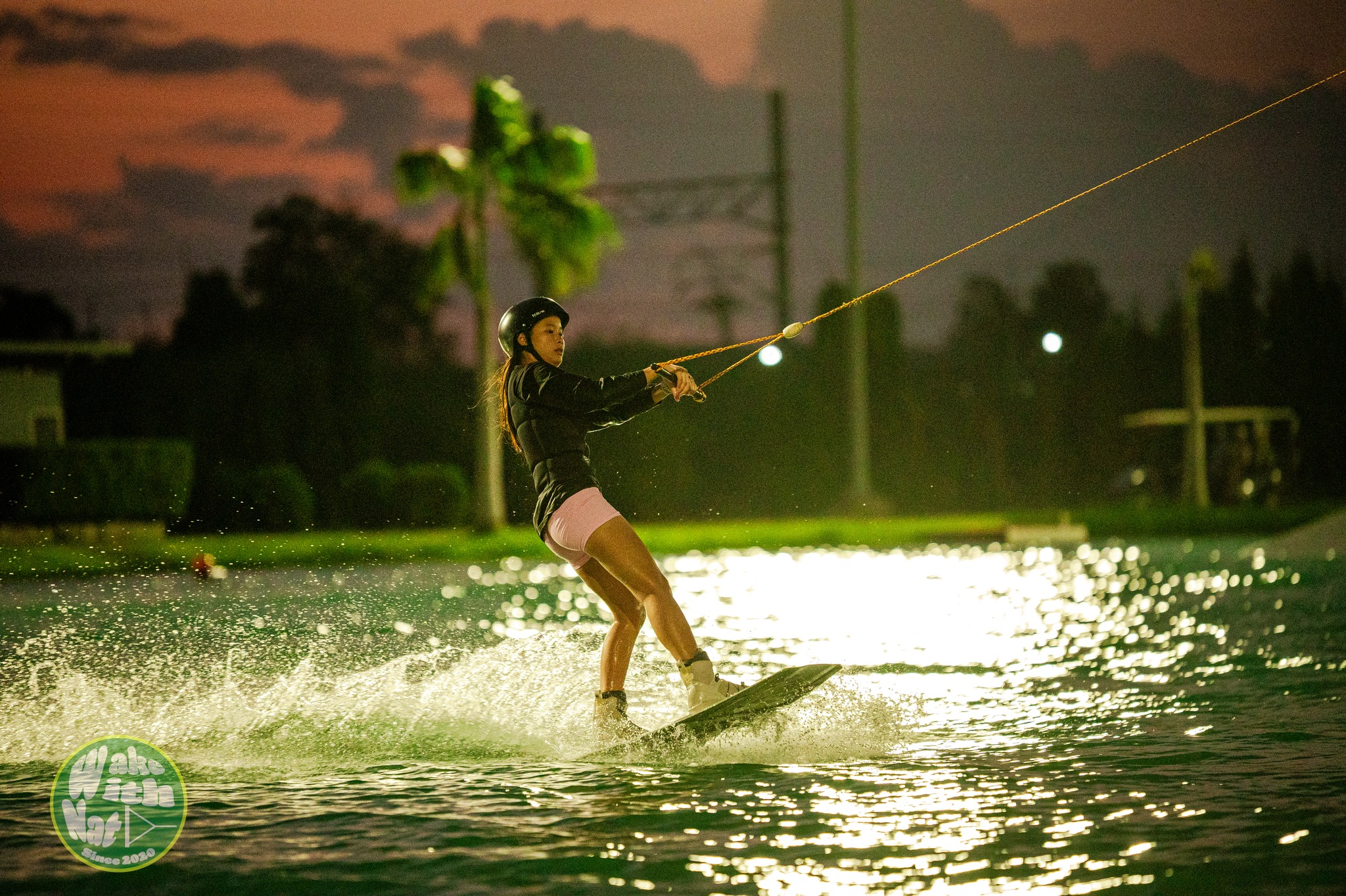 Rider sliding a kicker feature at ESC cable wake park Thailand