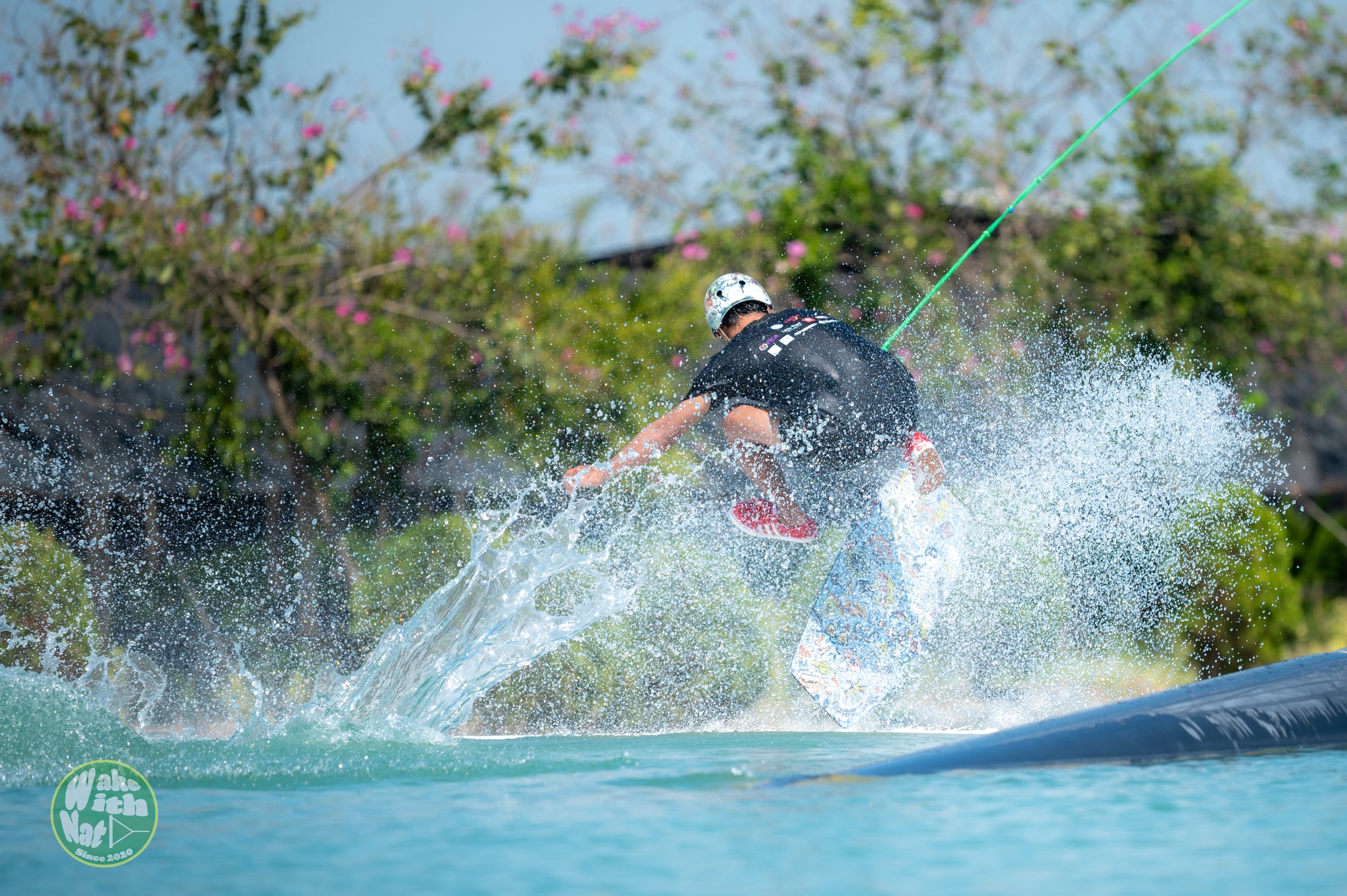Rider sliding a kicker at Little Plant Wake Park cable park Thailand