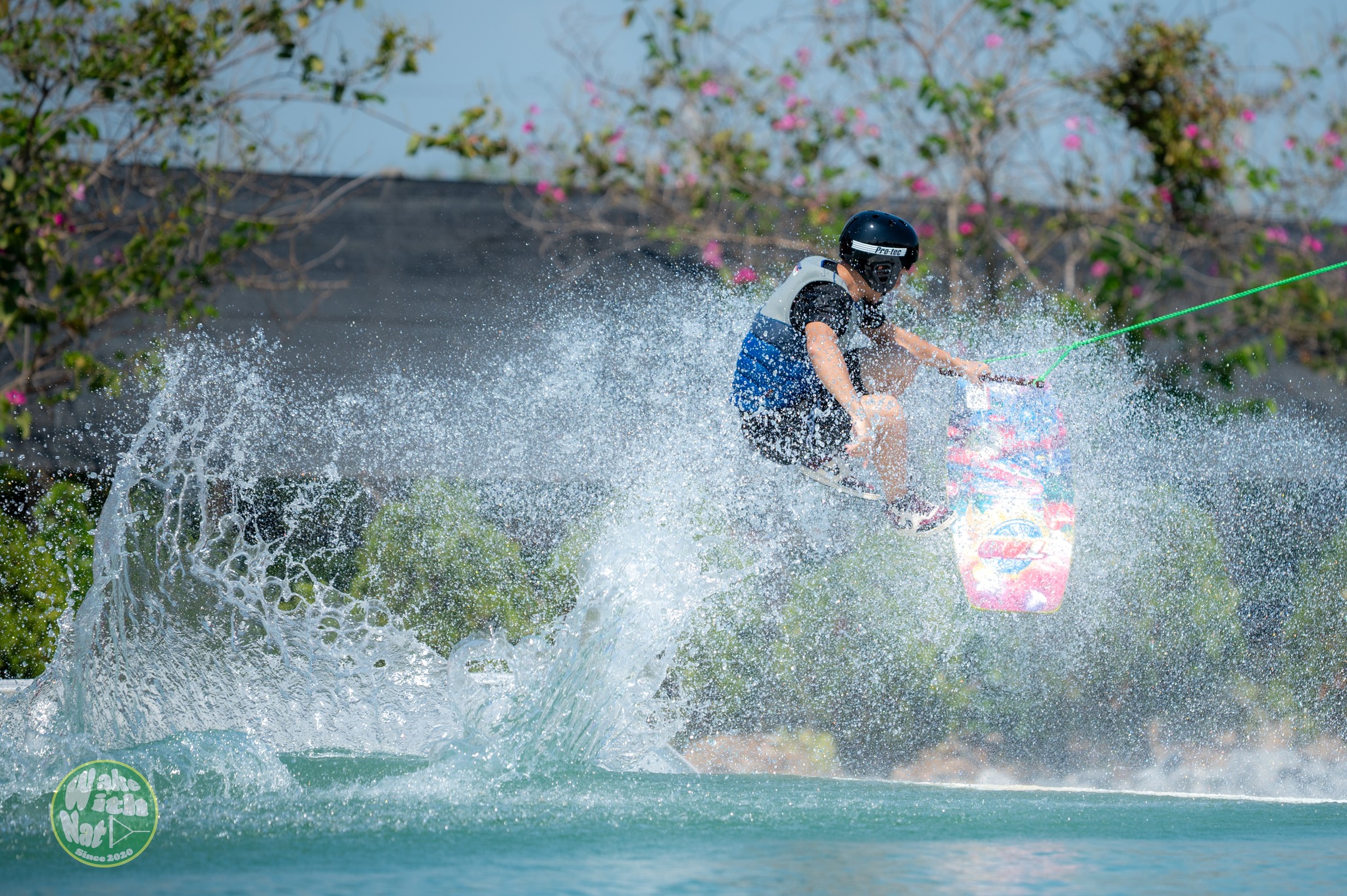 Wakeboarder launching off a kicker at Little Plant Wake Park Thailand
