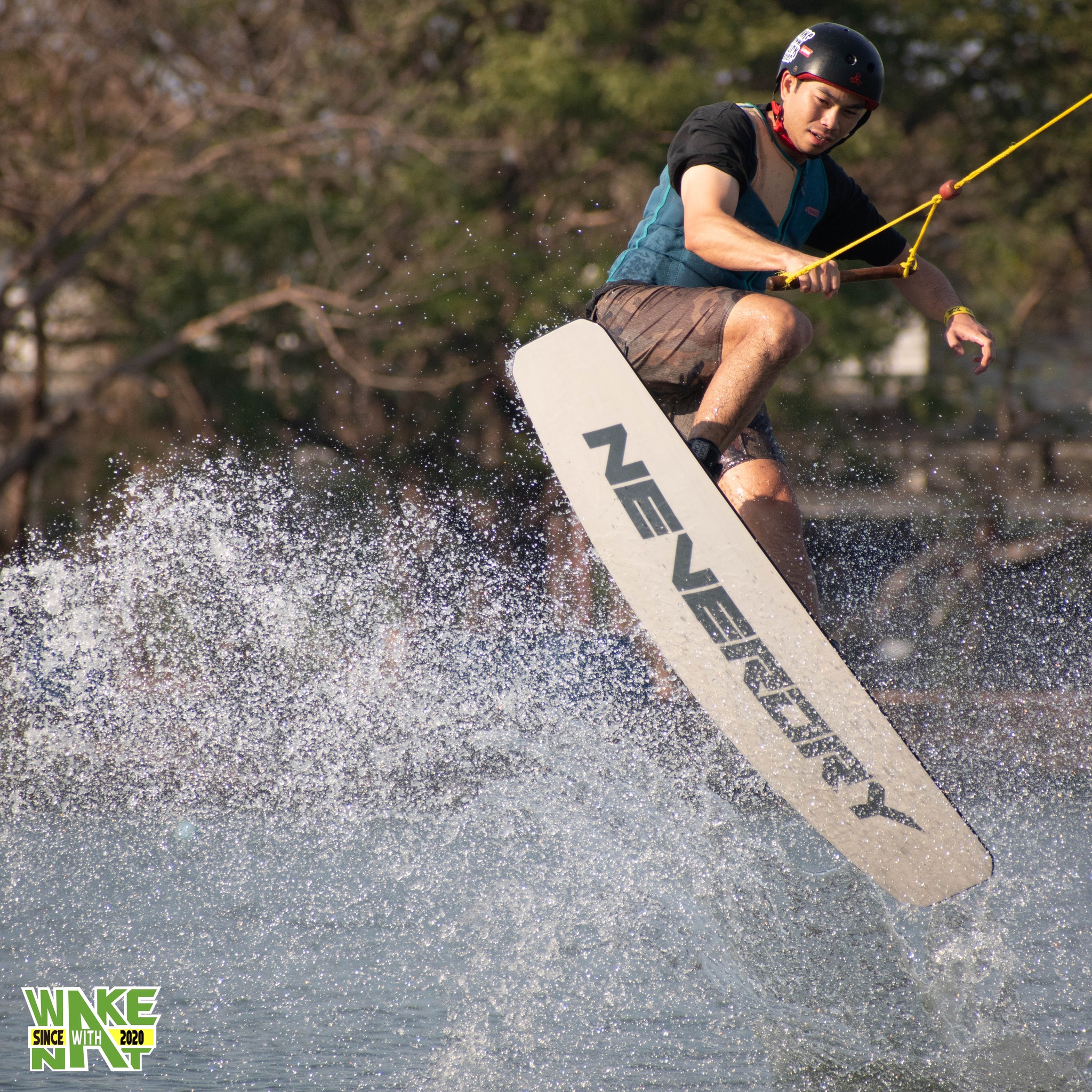 Wakeboarding action shot at Taco Lake cable park Bangkok