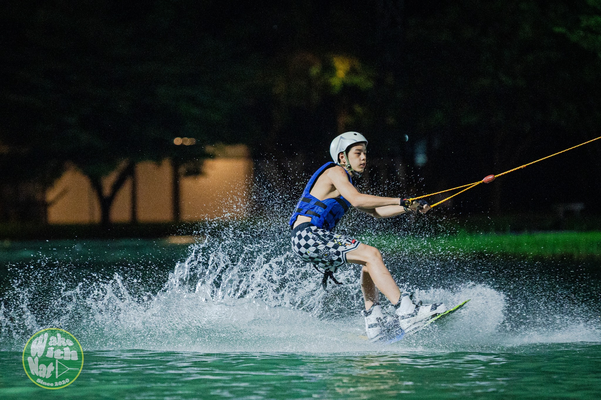 Atmosphere shot of wake riders waiting at Thai Wake Park Lumlukka dock