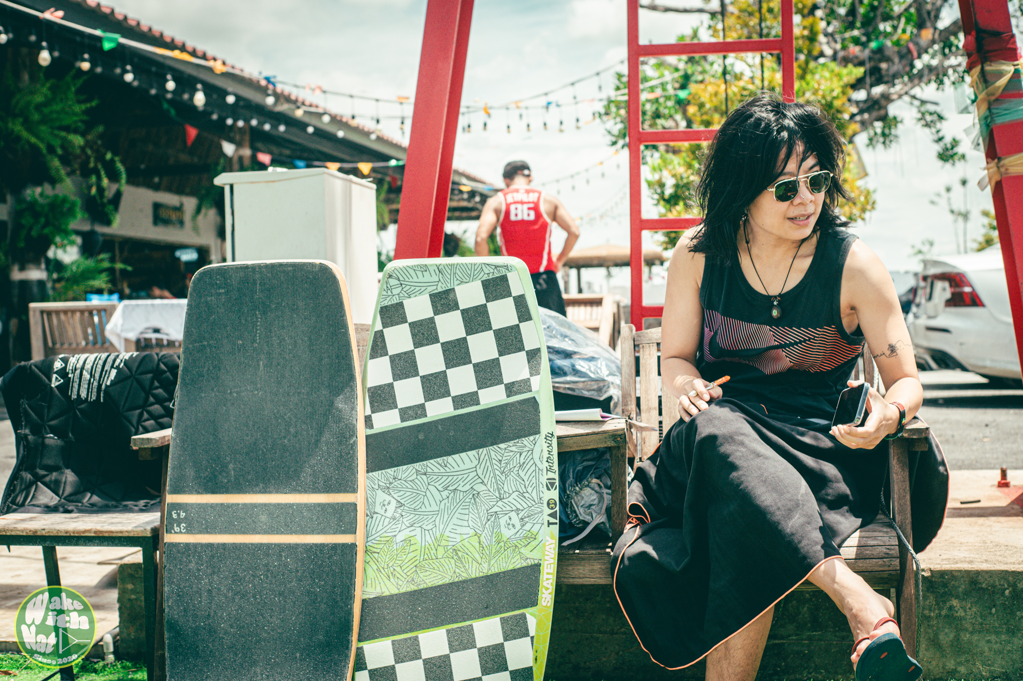 Rider throwing a toeside 360 at Varapa Wakepark - wakeboarding Thailand