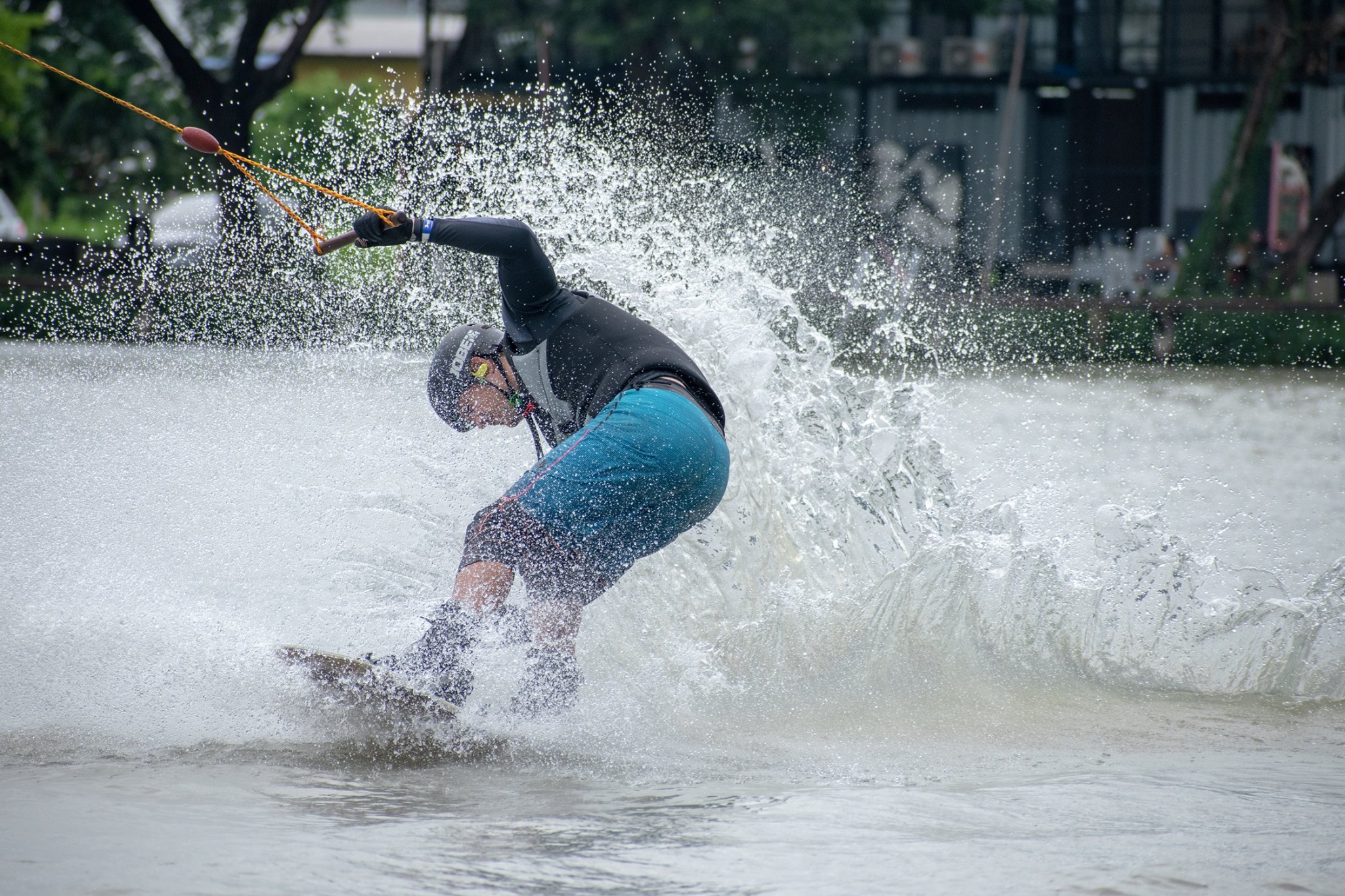 Rider throwing a heelside 180 at Zanook Wake Park - wakeboarding Thailand